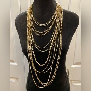 Chico’s gold multi strand statement necklace.